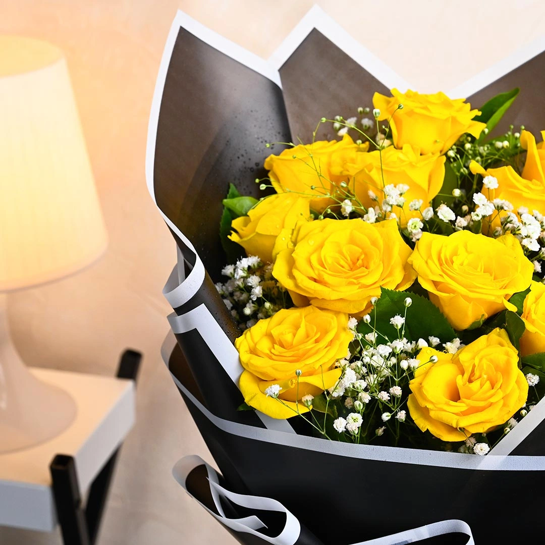 mesmerizingyellowrosesinblackpaperc