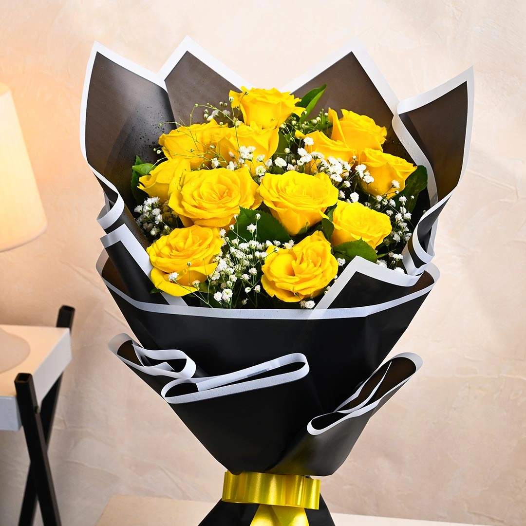 mesmerizingyellowrosesinblackpaperb