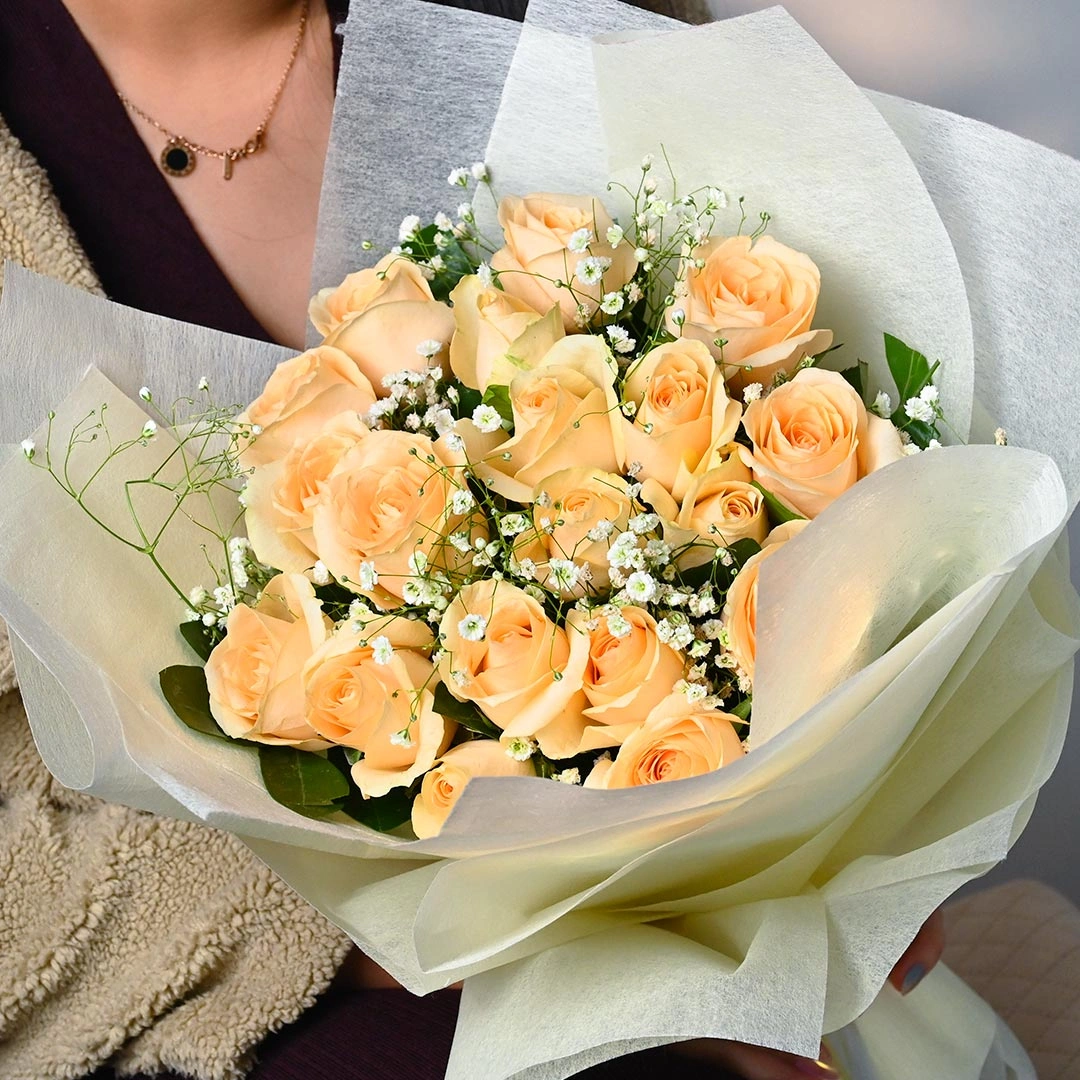 warmpeachcoloredrosebouquetb