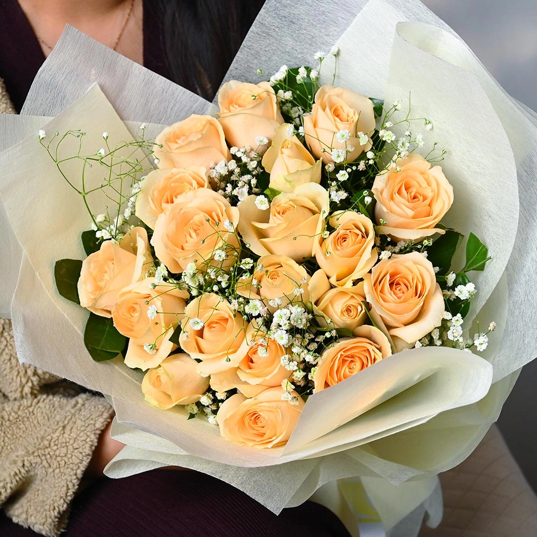 warmpeachcoloredrosebouquetd