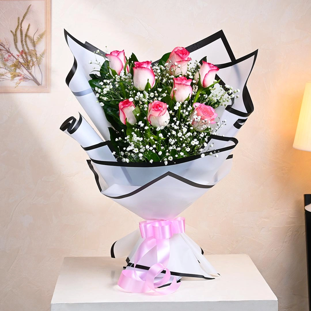 glowandblushpinkroseswithbabybreath